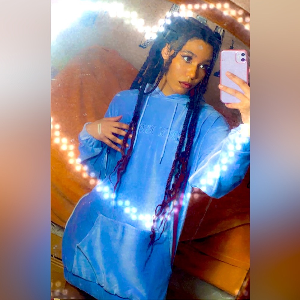 "Crybaby" oversized hoodie dress from Fashion
Nova.
